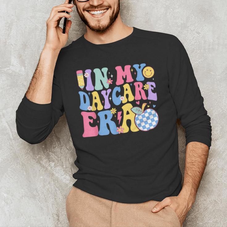 In My Daycare Era Groovy Teacher Daycare First Day Of School Men's Long Sleeve T-Shirt, novelty gifts, funny gifts In My Daycare Era Groovy Teacher Daycare First Day Of School Men's Long Sleeve T-Shirt, novelty gifts, funny gifts