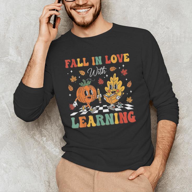 Groovy Fall In Love With Learning Autumn Pumpkin Teacher Men's Long Sleeve T-Shirt, novelty gifts, funny gifts
