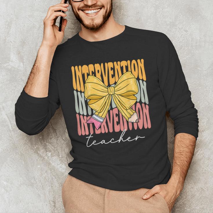 Interventionist Teacher Groovy Coquette Bow Back To School Men's Long Sleeve T-Shirt, novelty gifts, funny gifts Interventionist Teacher Groovy Coquette Bow Back To School Men's Long Sleeve T-Shirt, novelty gifts, funny gifts