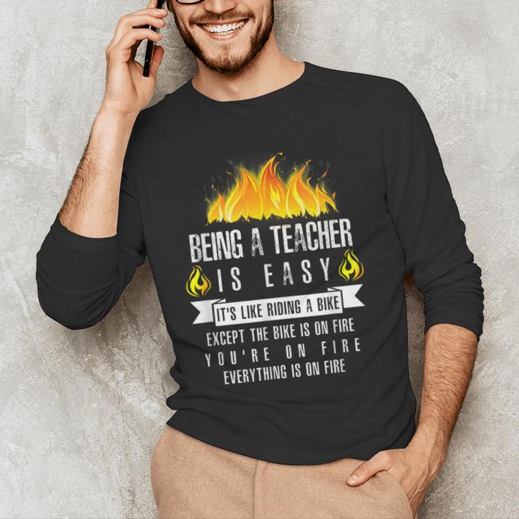 Being a Teacher Is Easy Everything Is On Fire T-Shirt For Men Women Kids Men's Long Sleeve T-Shirt, novelty gifts, funny gifts Being a Teacher Is Easy Everything Is On Fire T-Shirt For Men Women Kids Men's Long Sleeve T-Shirt, novelty gifts, funny gifts