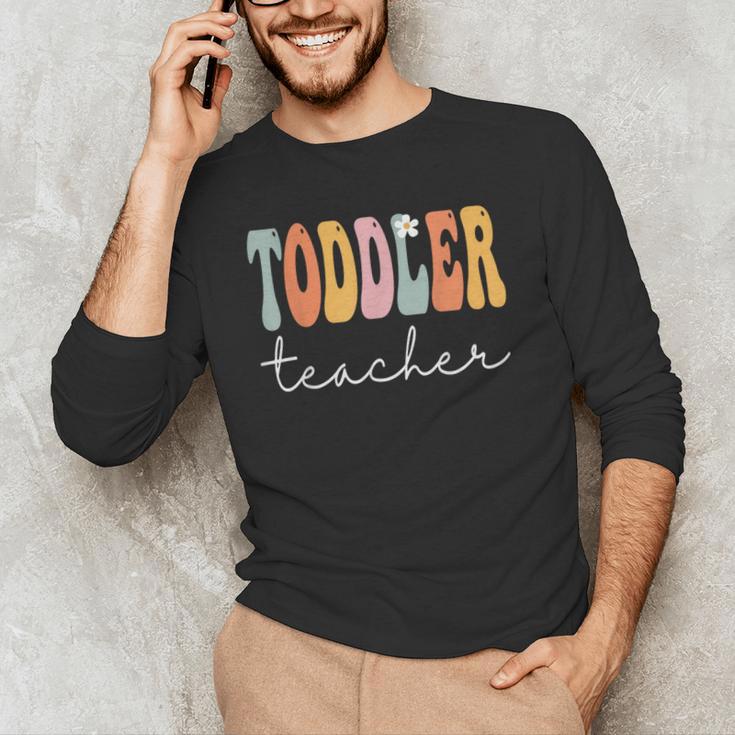Toddler Teacher Retro Groovy Women Happy First Day Of School Men's Long Sleeve T-Shirt, novelty gifts, funny gifts