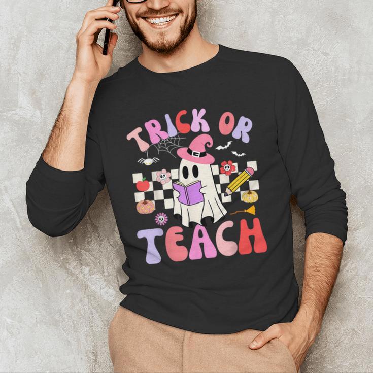 Trick Or Teach Halloween Teacher Floral Ghost Groovy Men's Long Sleeve T-Shirt, novelty gifts, funny gifts
