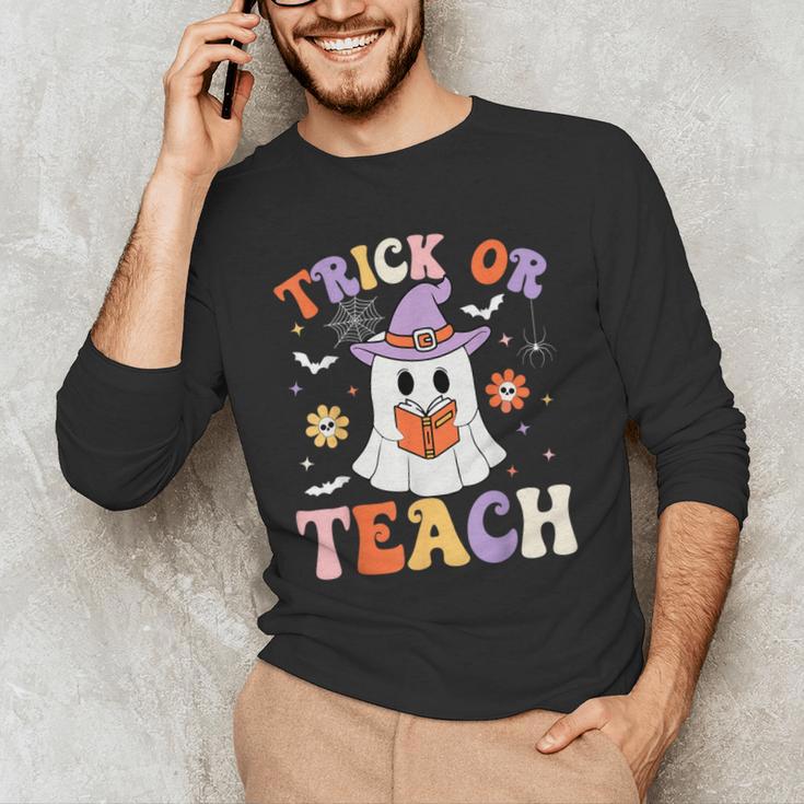 Trick Or Teach Teacher Groovy Ghost Halloween Teacher Men's Long Sleeve T-Shirt, novelty gifts, funny gifts