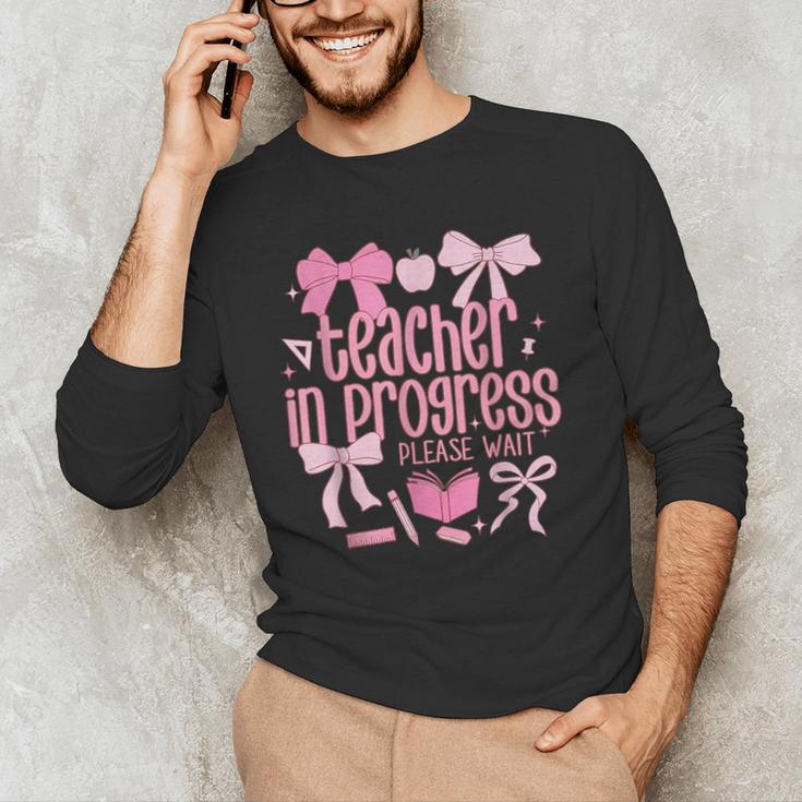 Women Teacher In Progress Coquette Pink Bow Future Teacher Men's Long Sleeve T-Shirt, novelty gifts, funny gifts Women Teacher In Progress Coquette Pink Bow Future Teacher Men's Long Sleeve T-Shirt, novelty gifts, funny gifts