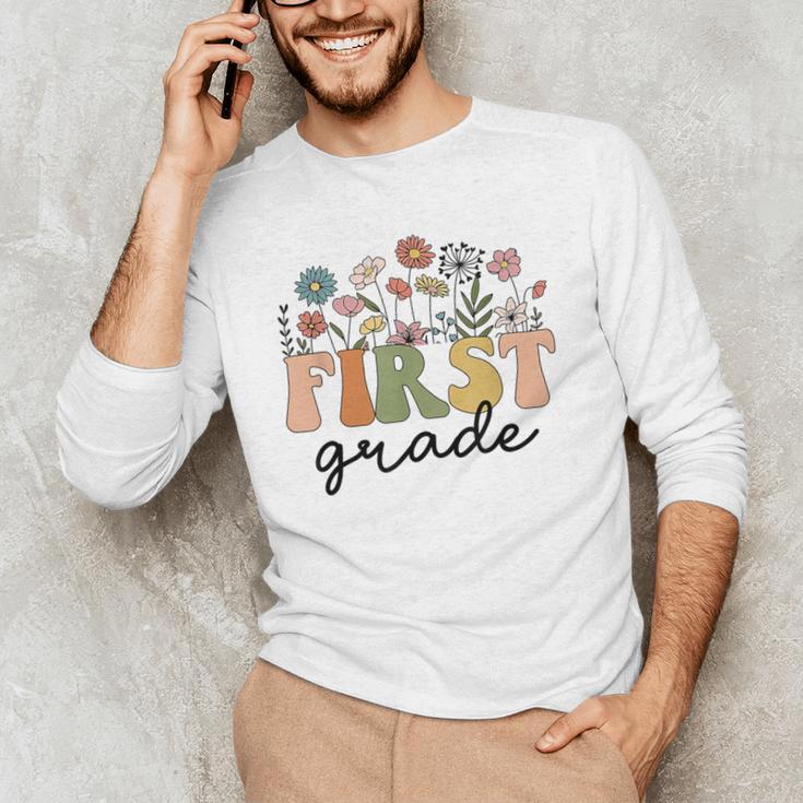 First Grade Teacher Wildflower Back To School Floral Outfits Men's Long Sleeve T-Shirt, novelty gifts, funny gifts