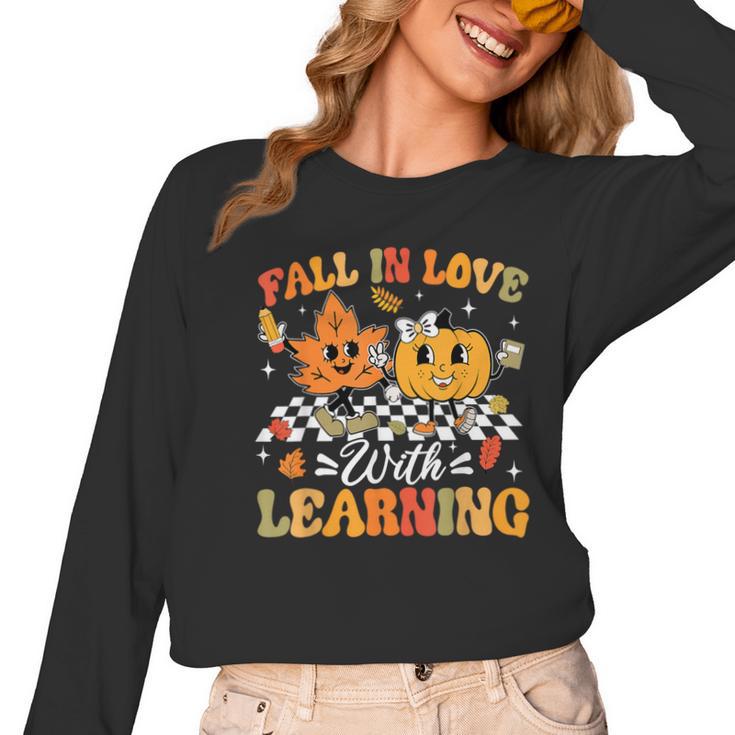 Fall In Love With Learning Fall Teacher Thanksgiving Retro Women Long Sleeve T-Shirt, trending gift