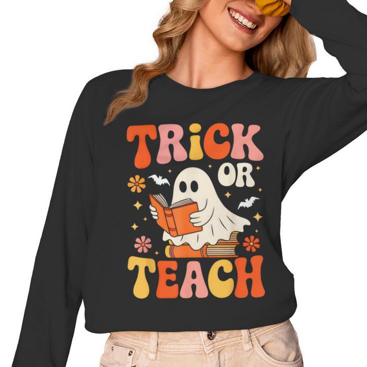 Trick Or Teach Halloween Shirt For Teacher Kids Floral Ghost Women Long Sleeve T-Shirt