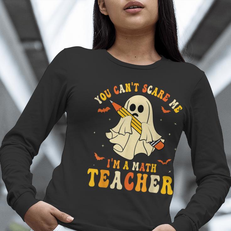 You Can't Scare Me I'm A Math Teacher Halloween Ghost Groovy Women Long Sleeve T-Shirt, Groovy Teacher Shirts, funny gift You Can't Scare Me I'm A Math Teacher Halloween Ghost Groovy Women Long Sleeve T-Shirt, Groovy Teacher Shirts, funny gift