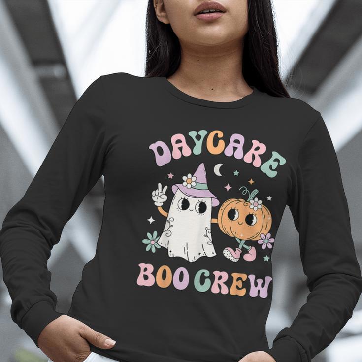 Daycare Boo Crew Groovy Halloween Floral Ghost Kid Teacher Women Long Sleeve T-Shirt, Groovy Teacher Shirts, funny gift Daycare Boo Crew Groovy Halloween Floral Ghost Kid Teacher Women Long Sleeve T-Shirt, Groovy Teacher Shirts, funny gift