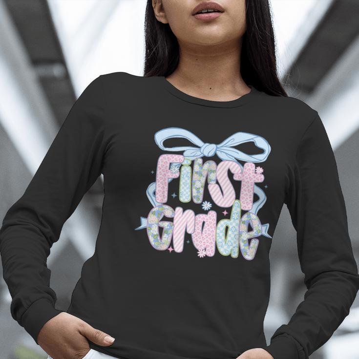 First Grade Coquette Bow Girls Teacher Team 1st Grade Squad Women Long Sleeve T-Shirt, First Grade Teacher Shirts, funny gift