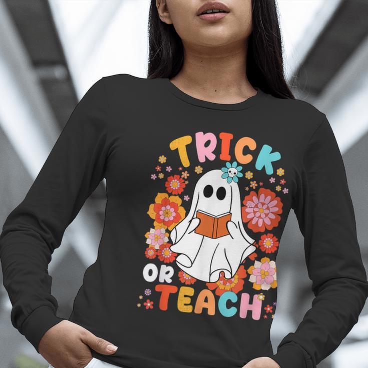 Groovy Halloween Trick Or Teach Retro Floral Ghost Teacher For Men Women Kids Women Long Sleeve T-Shirt, Groovy Teacher Shirts, funny gift Groovy Halloween Trick Or Teach Retro Floral Ghost Teacher For Men Women Kids Women Long Sleeve T-Shirt, Groovy Teacher Shirts, funny gift