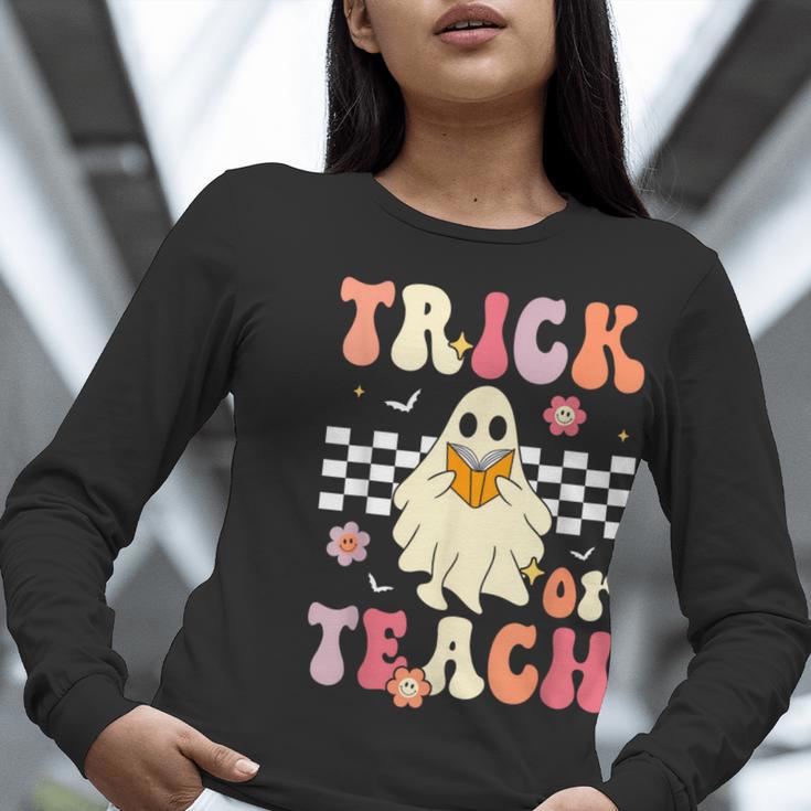 Groovy Teacher Halloween Retro Trick Or Teach Floral Ghost Women Long Sleeve T-Shirt, Groovy Teacher Shirts, funny gift