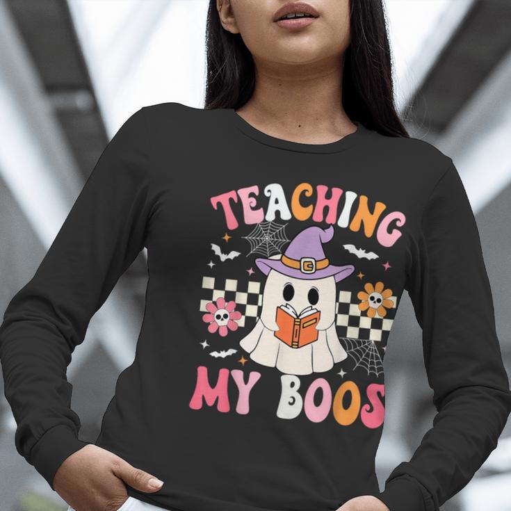 Groovy Teaching My Boos Teacher Ghost Halloween Teacher Women Long Sleeve T-Shirt, Groovy Teacher Shirts, funny gift Groovy Teaching My Boos Teacher Ghost Halloween Teacher Women Long Sleeve T-Shirt, Groovy Teacher Shirts, funny gift