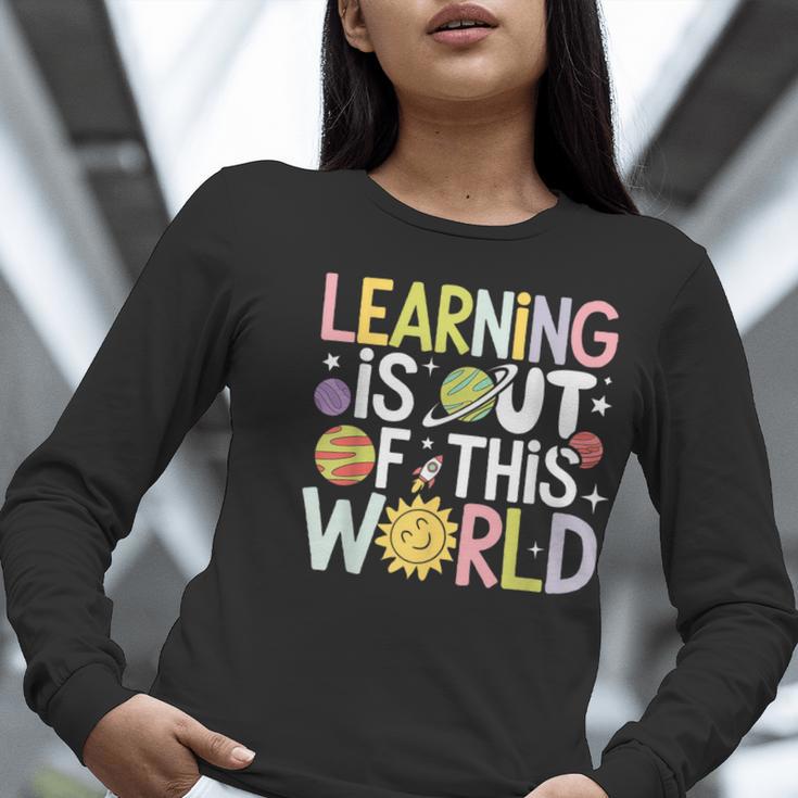 Learning Is Out Of This World Space Teacher Cute Groovy Women Long Sleeve T-Shirt, Groovy Teacher Shirts, funny gift Learning Is Out Of This World Space Teacher Cute Groovy Women Long Sleeve T-Shirt, Groovy Teacher Shirts, funny gift