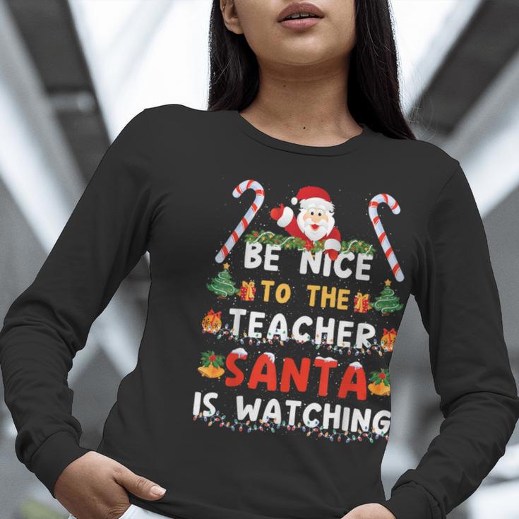 Be Nice To The Teacher Santa Is Watching Christmas Women Long Sleeve T-Shirt, funny gift Be Nice To The Teacher Santa Is Watching Christmas Women Long Sleeve T-Shirt, funny gift