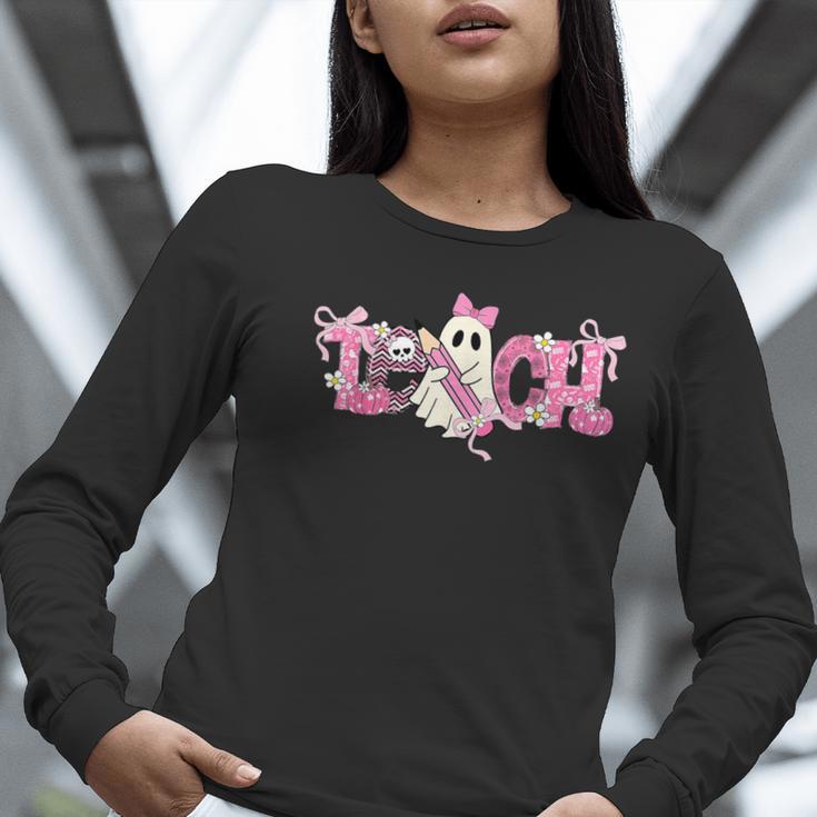 Pink Ghost Teach Halloween Teacher In Spooky Season Women Long Sleeve T-Shirt, funny gift Pink Ghost Teach Halloween Teacher In Spooky Season Women Long Sleeve T-Shirt, funny gift