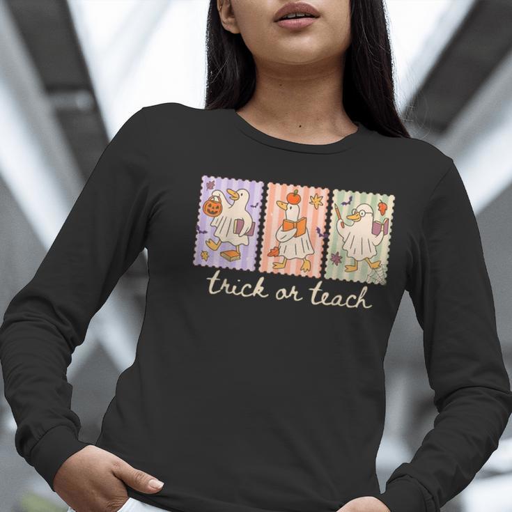 Preppy Goose Teacher Trick Or Teach Halloween Teacher Goose Women Long Sleeve T-Shirt, funny gift