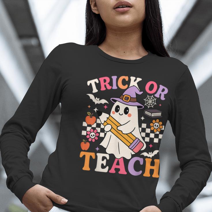 Retro Floral Ghost Trick Or Teach Groovy Teacher Halloween Women Long Sleeve T-Shirt, Groovy Teacher Shirts, funny gift