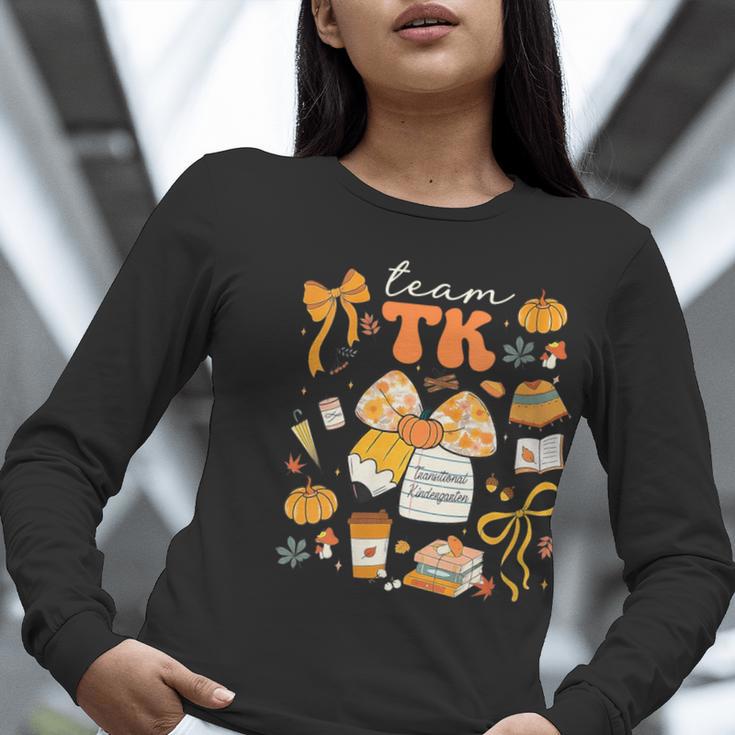 Team TK Crew Preppy Coquette Bow Pumpkin Fall TK Teacher Women Long Sleeve T-Shirt, funny gift