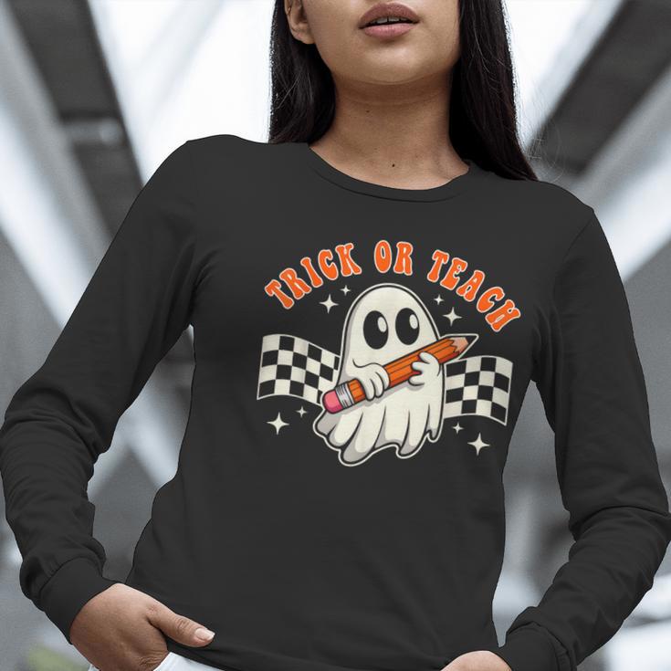 Trick Or Teach Groovy Retro Ghost Halloween Teacher Kids Women Long Sleeve T-Shirt, Groovy Teacher Shirts, funny gift Trick Or Teach Groovy Retro Ghost Halloween Teacher Kids Women Long Sleeve T-Shirt, Groovy Teacher Shirts, funny gift