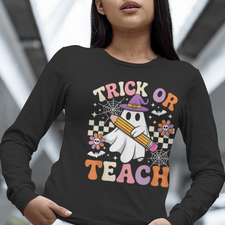 Trick Or Teach Groovy Teacher Halloween Retro Ghost Women Long Sleeve T-Shirt, Groovy Teacher Shirts, funny gift