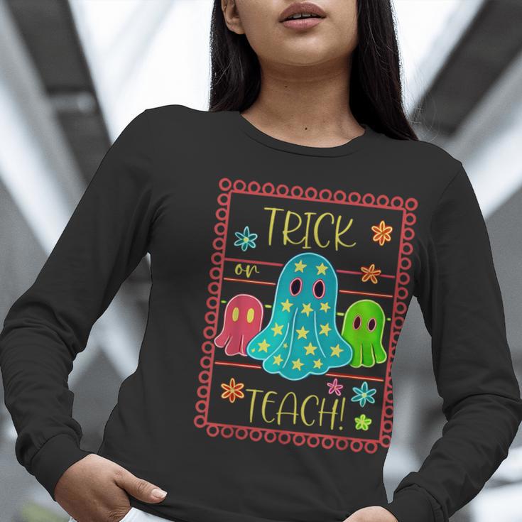 Trick Or Teach Neon Ghost Flower Teacher Spooky Halloween Women Long Sleeve T-Shirt, funny gift Trick Or Teach Neon Ghost Flower Teacher Spooky Halloween Women Long Sleeve T-Shirt, funny gift
