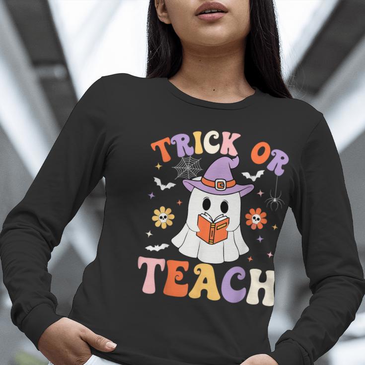 Trick Or Teach Teacher Groovy Ghost Halloween Teacher Women Long Sleeve T-Shirt, Groovy Teacher Shirts, funny gift