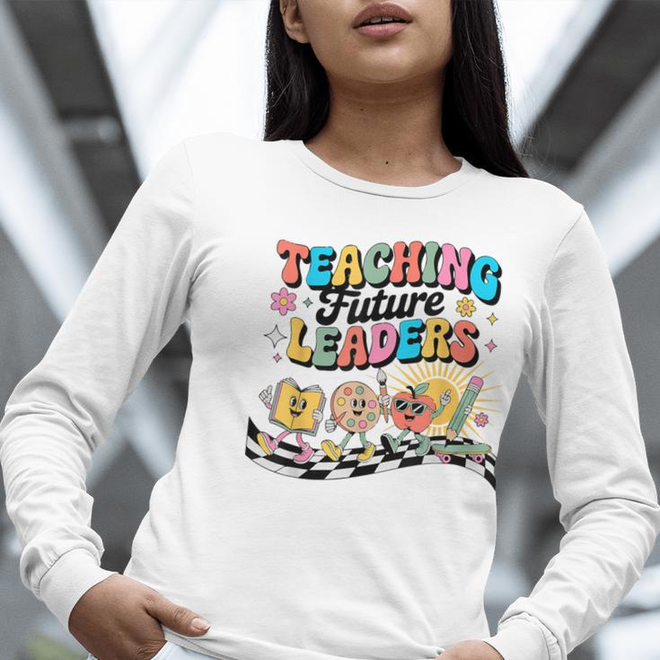 Retro Teaching Future Leaders Groovy Teacher Back To School Women Long Sleeve T-Shirt, Future Teacher Shirts, Groovy Teacher Shirts, funny gift
