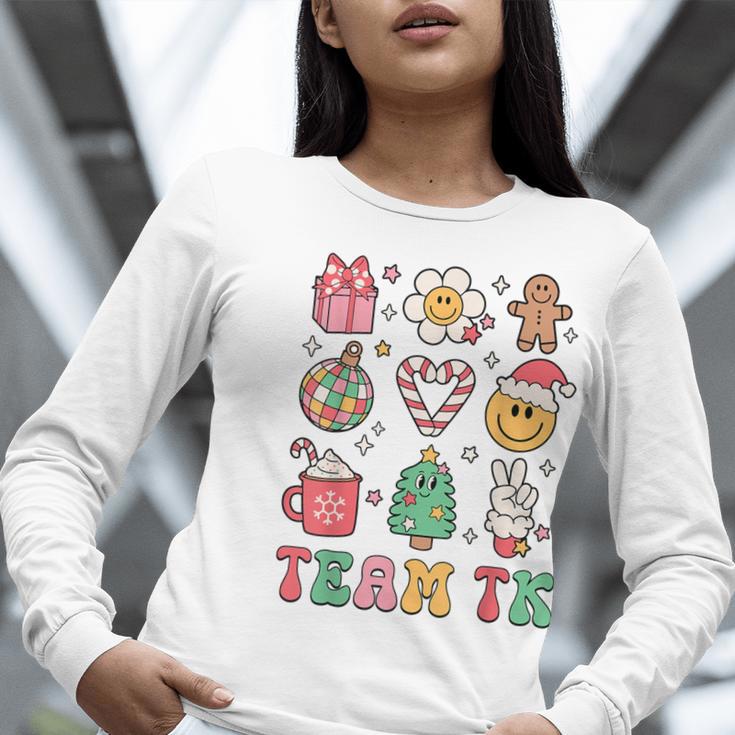 Team TK Teacher Christmas Groovy Smile Face Girl Boy Kid TK Women Long Sleeve T-Shirt, Groovy Teacher Shirts, funny gift Team TK Teacher Christmas Groovy Smile Face Girl Boy Kid TK Women Long Sleeve T-Shirt, Groovy Teacher Shirts, funny gift