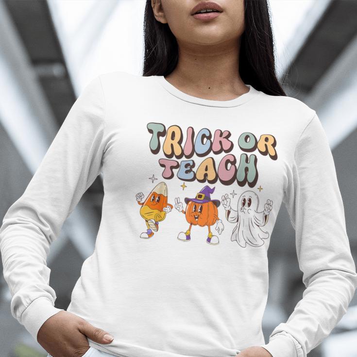 Trick Or Teach Candy Corn Pumpkin Ghost Teacher Women Long Sleeve T-Shirt, funny gift Trick Or Teach Candy Corn Pumpkin Ghost Teacher Women Long Sleeve T-Shirt, funny gift