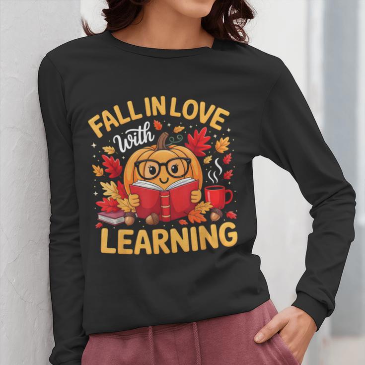Fall In Love With Learning Pumpkin Thanksgiving Teacher Fall Women Long Sleeve T-Shirt, funny design