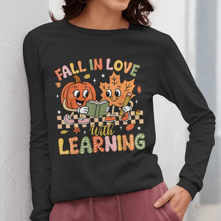 Retro Fall In Love With Learning Autumn Pumpkin Teacher Kids Women Long Sleeve T-Shirt, funny design