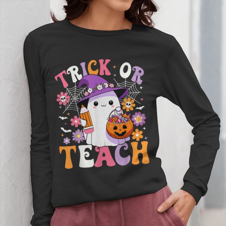Trick Or Teach Groovy Teacher Ghost Halloween Teacher Women Long Sleeve T-Shirt, Groovy Teacher Gifts, funny design Trick Or Teach Groovy Teacher Ghost Halloween Teacher Women Long Sleeve T-Shirt, Groovy Teacher Gifts, funny design