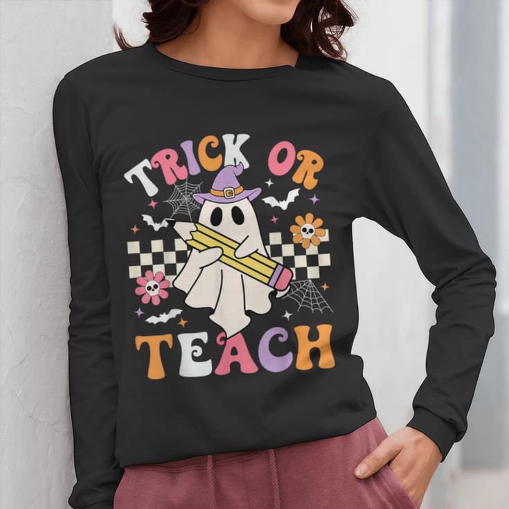 Trick Or Teach Groovy Teacher Halloween Retro Teacher Ghost Women Long Sleeve T-Shirt, Groovy Teacher Gifts, funny design