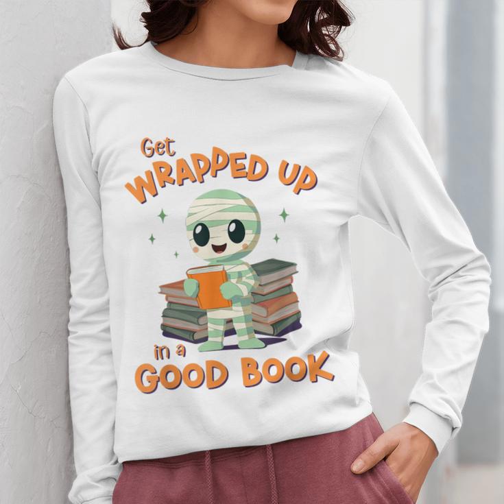 Cute Halloween Teacher Librarian Mummy Reading Books Women Long Sleeve T-Shirt, funny design