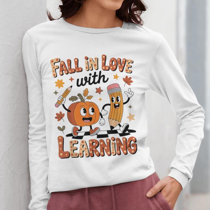 Retro Fall In Love With Learning Autumn Pumpkin Teacher Kids Women Long Sleeve T-Shirt, funny design