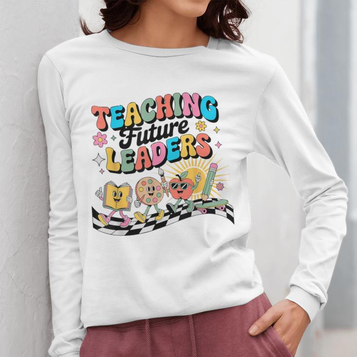 Retro Teaching Future Leaders Groovy Teacher Back To School Women Long Sleeve T-Shirt, Future Teacher Gifts, Groovy Teacher Gifts, funny design