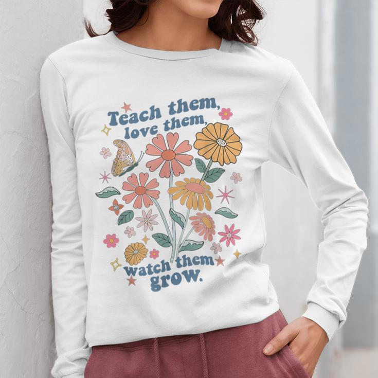 Teach Them Love Them Watch Them Grow Retro Teacher Floral Women Long Sleeve T-Shirt, funny design