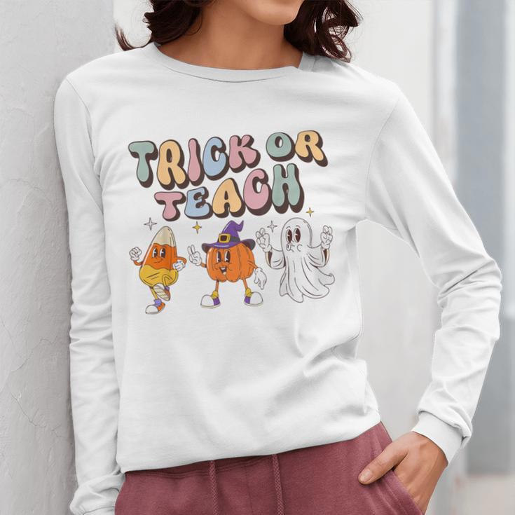 Trick Or Teach Candy Corn Pumpkin Ghost Teacher Women Long Sleeve T-Shirt, funny design Trick Or Teach Candy Corn Pumpkin Ghost Teacher Women Long Sleeve T-Shirt, funny design