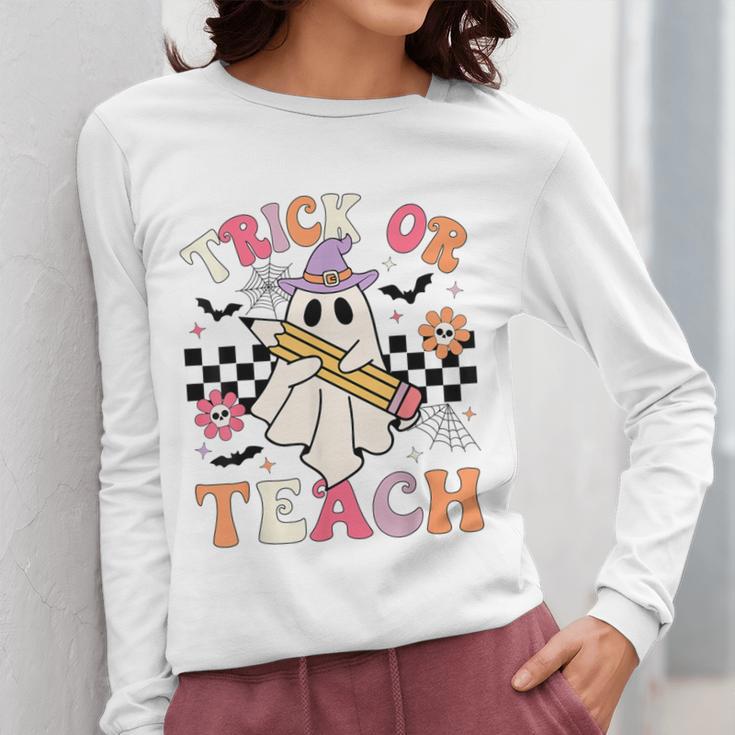 Trick Or Teach Groovy Teacher Halloween Retro Floral Ghost Women Long Sleeve T-Shirt, Groovy Teacher Gifts, funny design