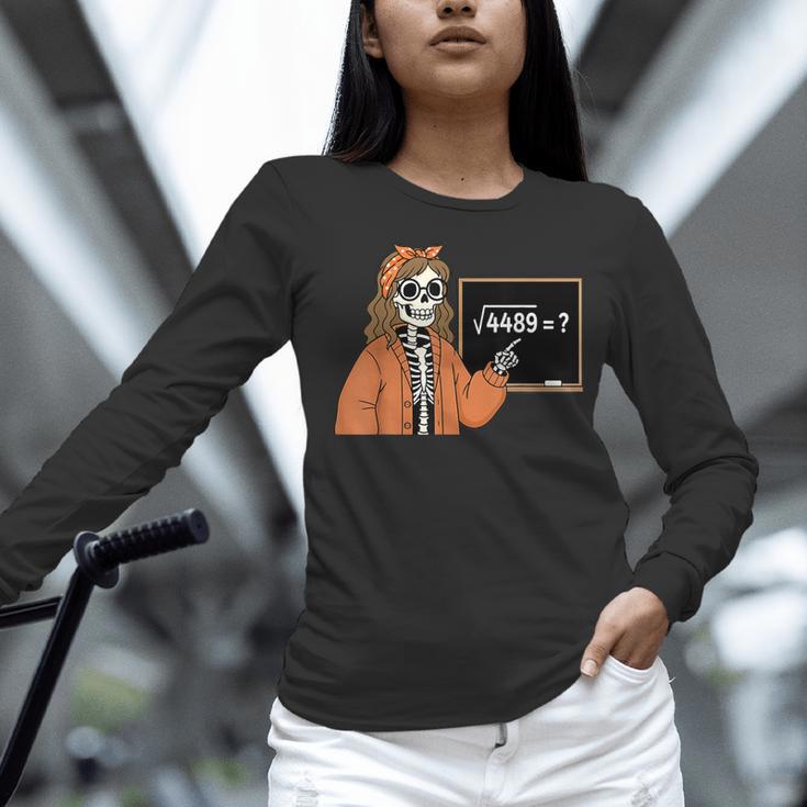 67 Math Teacher Skeleton Halloween Root 4489 Messy Bun Women Women Long Sleeve T-Shirt, gift for family, gift for coworker 67 Math Teacher Skeleton Halloween Root 4489 Messy Bun Women Women Long Sleeve T-Shirt, gift for family, gift for coworker