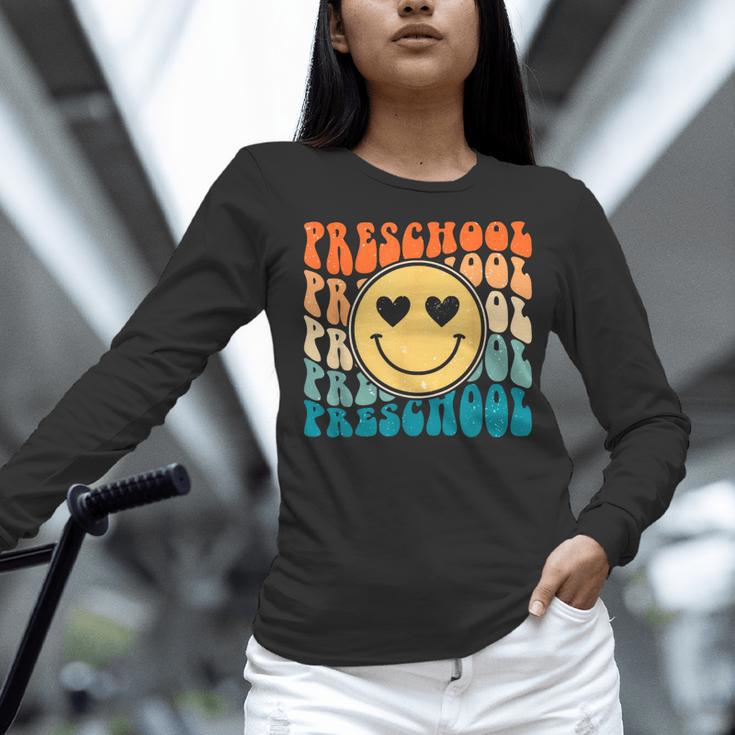 Back To School Groovy Smile Preschool Teachers Students Kids Women Long Sleeve T-Shirt, gift for family, gift for coworker