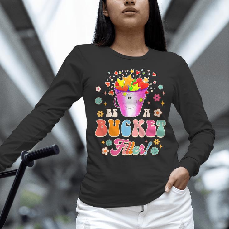 Be A Bucket Filler Teacher Teaching Groovy Back To School For Men Women Women Long Sleeve T-Shirt, Groovy Teacher Shirts, gift for family, gift for coworker Be A Bucket Filler Teacher Teaching Groovy Back To School For Men Women Women Long Sleeve T-Shirt, Groovy Teacher Shirts, gift for family, gift for coworker