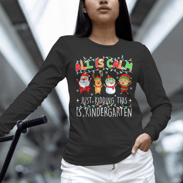 All Is Calm Xmas Kindergarten Christmas Season Teacher Women Long Sleeve T-Shirt, gift for family, gift for coworker All Is Calm Xmas Kindergarten Christmas Season Teacher Women Long Sleeve T-Shirt, gift for family, gift for coworker