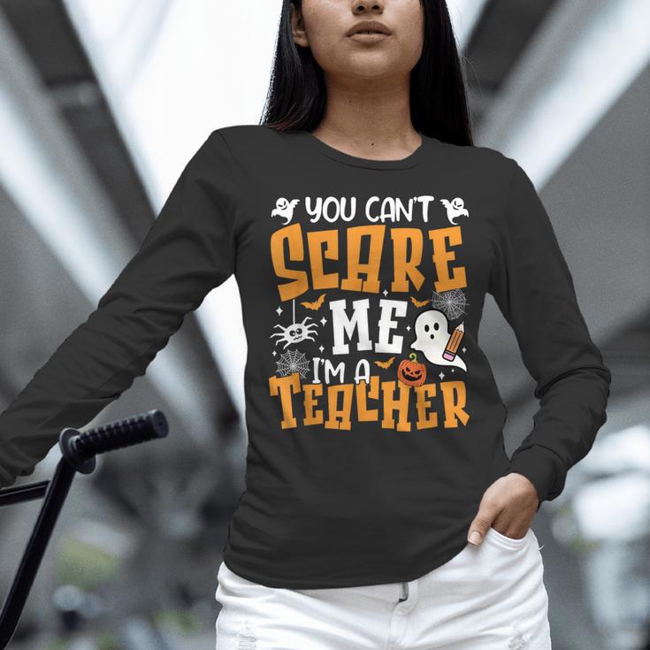 You Can't Scare Me I'm A Teacher Halloween Spooky Season Women Long Sleeve T-Shirt, gift for family, gift for coworker You Can't Scare Me I'm A Teacher Halloween Spooky Season Women Long Sleeve T-Shirt, gift for family, gift for coworker