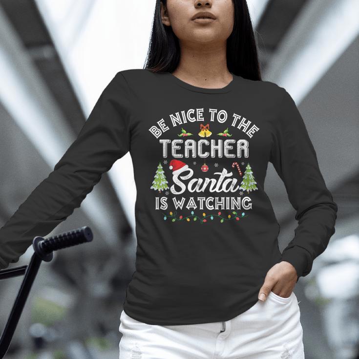 Christmas Be Nice To The Teacher Santa Is Watching Xmas Women Long Sleeve T-Shirt, gift for family, gift for coworker Christmas Be Nice To The Teacher Santa Is Watching Xmas Women Long Sleeve T-Shirt, gift for family, gift for coworker