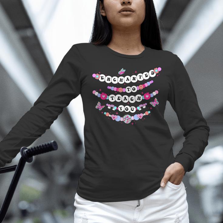 Enchanted To Teach You Bracelet Teacher Back To School Women Long Sleeve T-Shirt, gift for family, gift for coworker