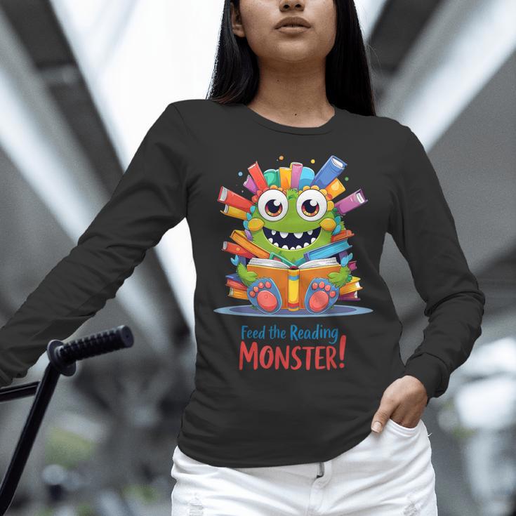 Feed The Reading Monster Halloween Teacher Women Long Sleeve T-Shirt, gift for family, gift for coworker Feed The Reading Monster Halloween Teacher Women Long Sleeve T-Shirt, gift for family, gift for coworker