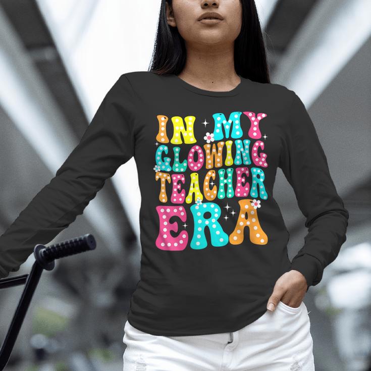 In My Glowing Teacher Era Groovy Colorful Bright Women Long Sleeve T-Shirt, Groovy Teacher Shirts, gift for family, gift for coworker In My Glowing Teacher Era Groovy Colorful Bright Women Long Sleeve T-Shirt, Groovy Teacher Shirts, gift for family, gift for coworker