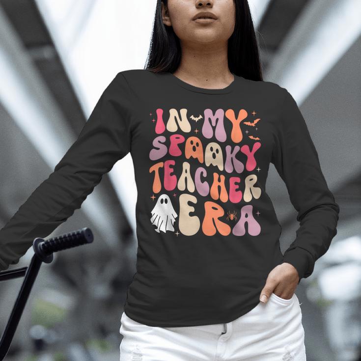 Groovy In My Spooky Teacher Era Halloween Party Boo Women Long Sleeve T-Shirt, Groovy Teacher Shirts, gift for family, gift for coworker Groovy In My Spooky Teacher Era Halloween Party Boo Women Long Sleeve T-Shirt, Groovy Teacher Shirts, gift for family, gift for coworker